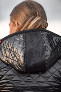 Softshell_True_Rider_Shield_Black_and_Gold.webp